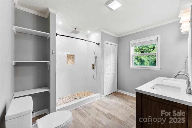 228 Tot Dellinger Rd, Cherryville, NC 28021 - bathroom featuring toilet, a stall shower, crown molding, double vanity, and a closet