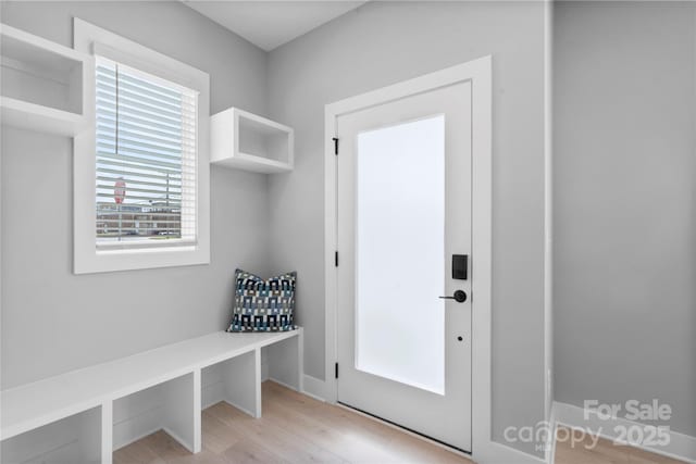 mudroom featuring light wood-style flooring