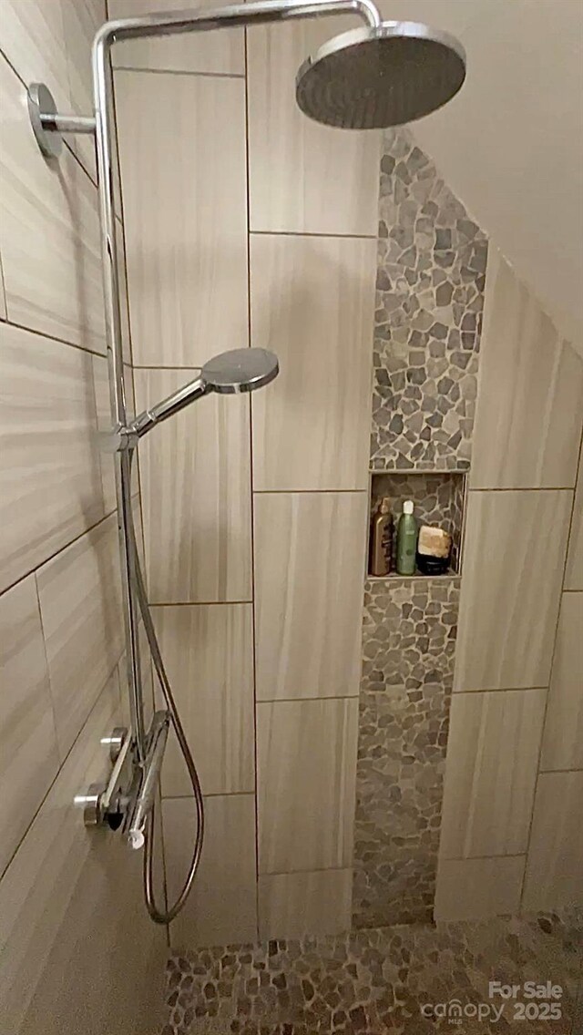 details with a tile shower