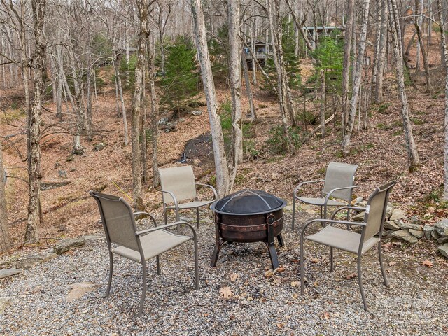 view of patio / terrace featuring a fire pit