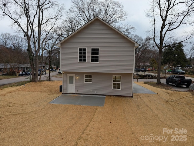 rear view of property with a patio