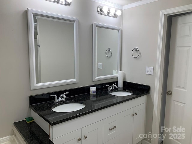 bathroom featuring double vanity and a sink