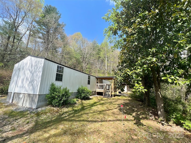 1019 Hudlin Gap Rd, Pisgah Forest, NC 28768 - exterior space with a deck