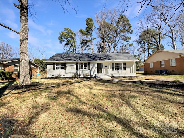 view of front facade with crawl space, a front lawn, and central AC unit