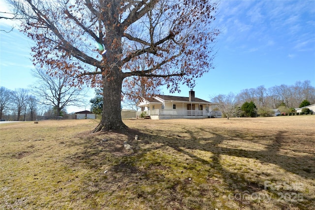 view of yard with a porch