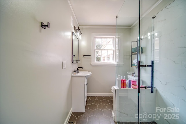 full bath featuring a stall shower, baseboards, toilet, ornamental molding, and vanity