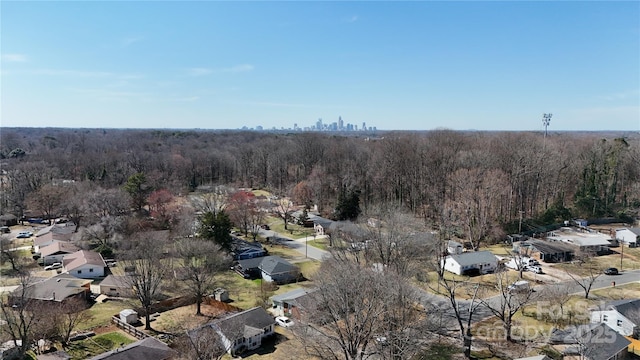 drone / aerial view with a forest view