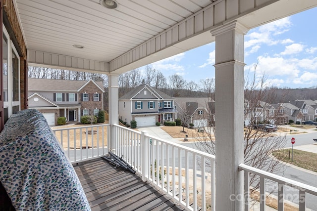 balcony featuring a residential view