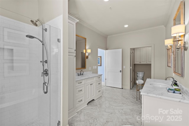 bathroom with two vanities, a sink, marble finish floor, a shower stall, and crown molding