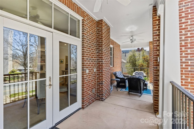 exterior space featuring a ceiling fan and french doors