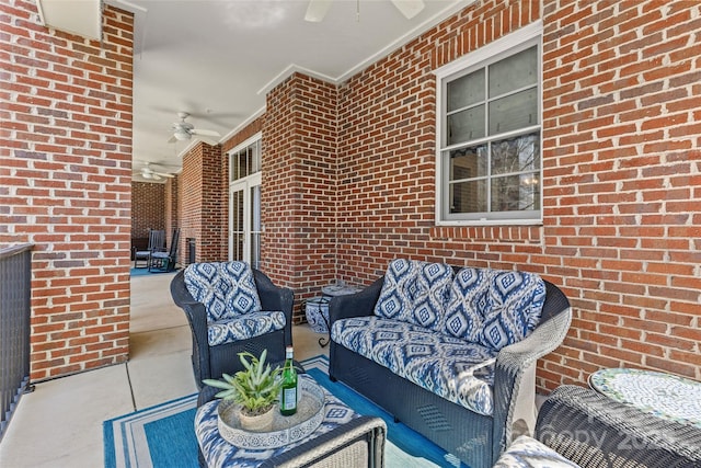 view of patio / terrace with an outdoor hangout area and a ceiling fan