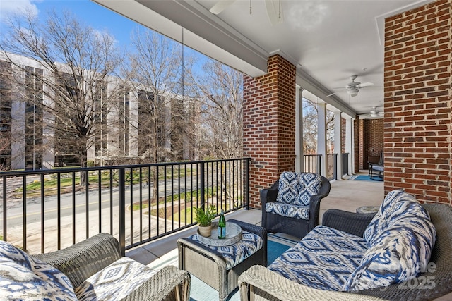 balcony with a ceiling fan