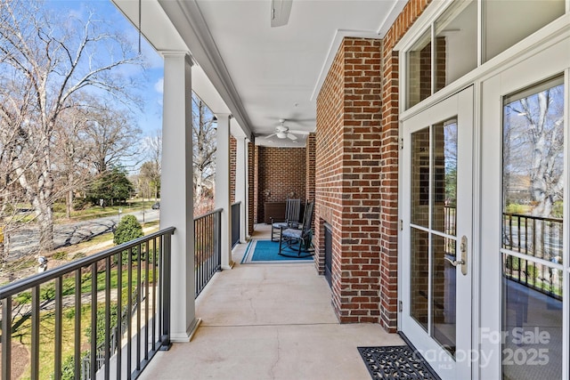 balcony featuring a porch