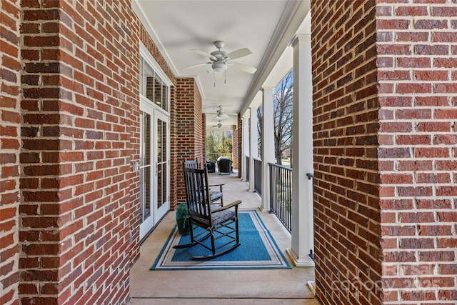 view of patio featuring ceiling fan