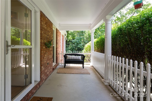 view of patio featuring a porch