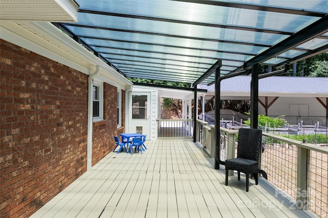 wooden terrace featuring a pergola