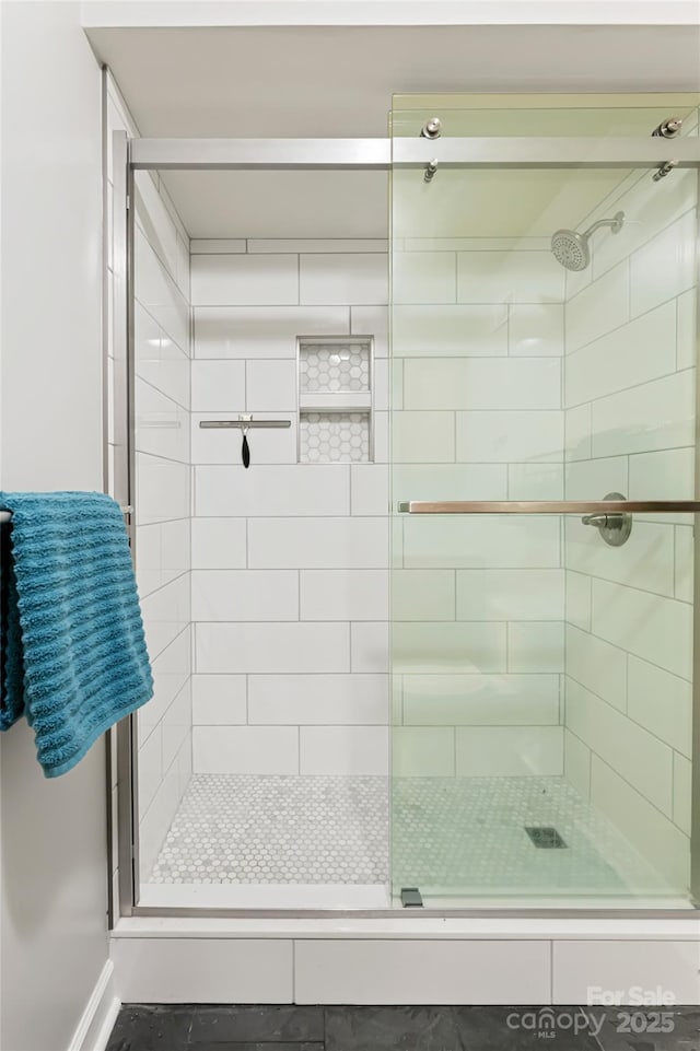 full bath featuring a stall shower