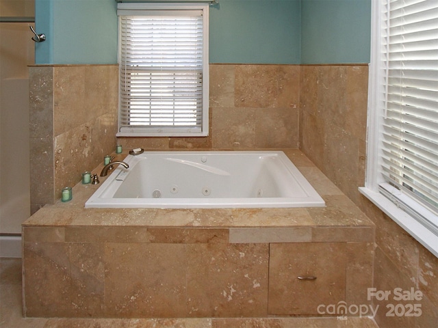 full bath featuring a whirlpool tub