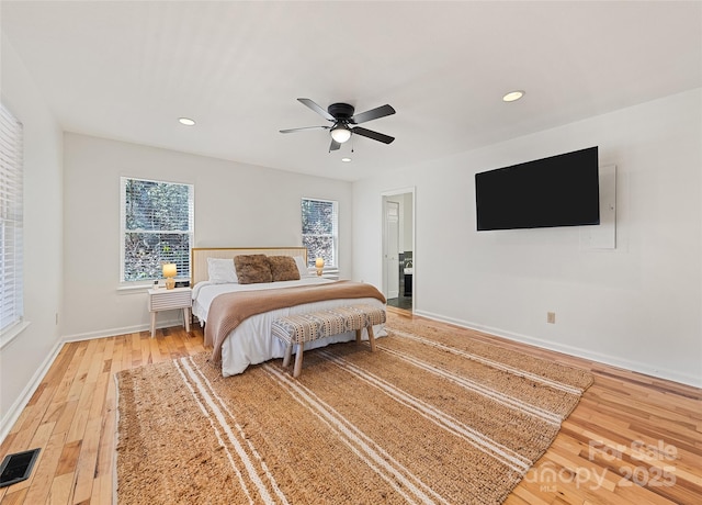 bedroom featuring ceiling fan, recessed lighting, visible vents, baseboards, and light wood-type flooring