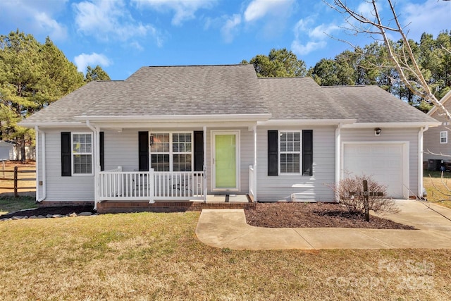 view of front of house with a garage, a shingled roof, a porch, and a front yard