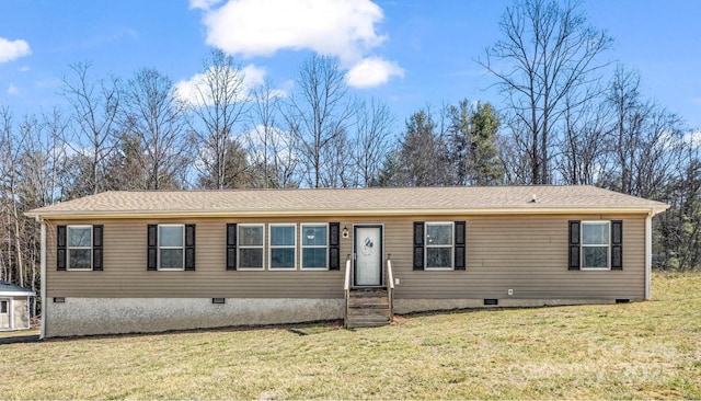 view of front facade with entry steps, crawl space, and a front lawn