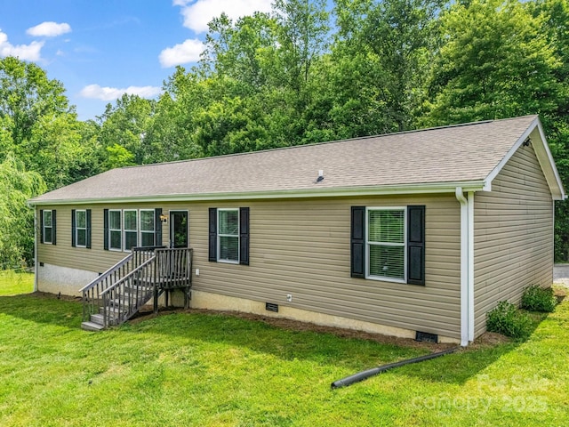 981 Gilliam Mountain Rd, Hendersonville, NC 28792 - view of front facade featuring crawl space, a front yard, and a shingled roof