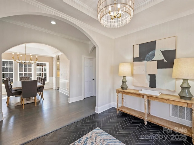 home office featuring baseboards, visible vents, a raised ceiling, dark wood-type flooring, and an inviting chandelier