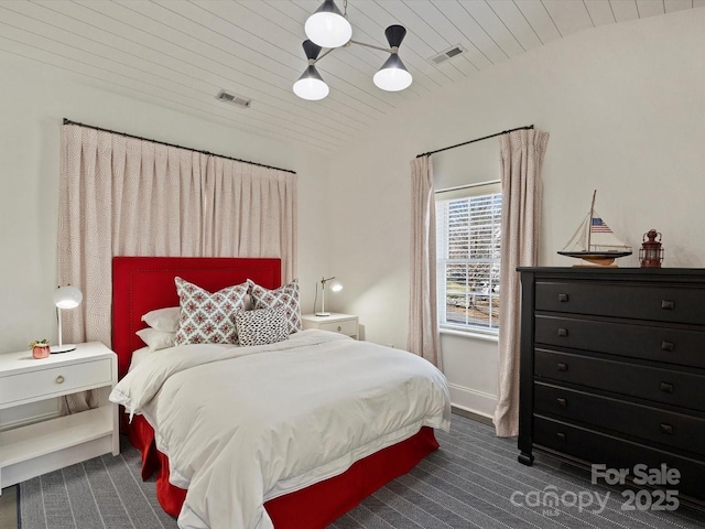 carpeted bedroom featuring wood ceiling, visible vents, vaulted ceiling, and baseboards