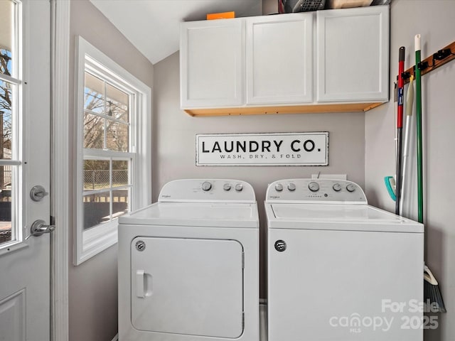 laundry area featuring cabinet space and washer and dryer