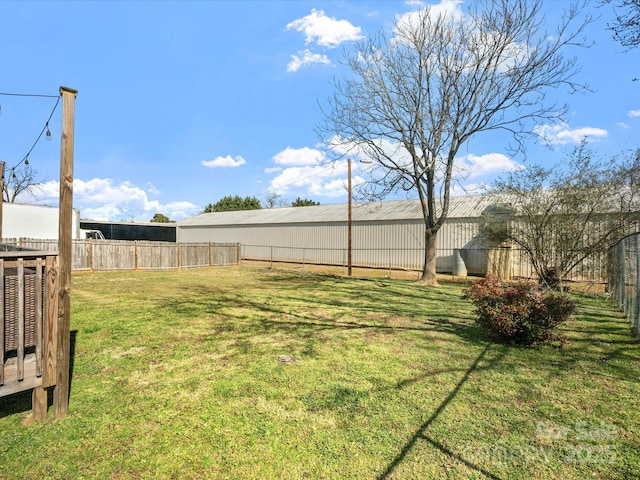 view of yard with a fenced backyard