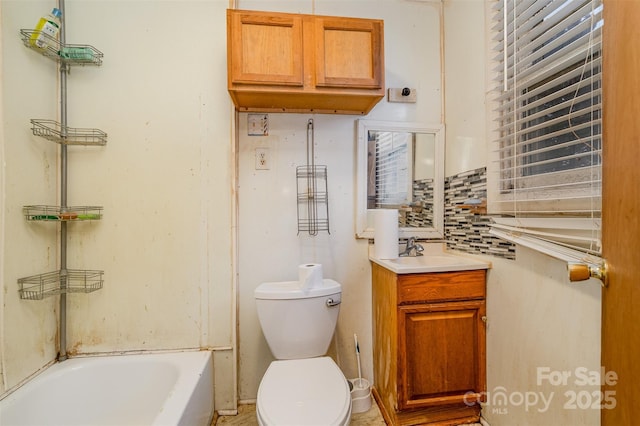 full bath featuring backsplash, toilet, and vanity