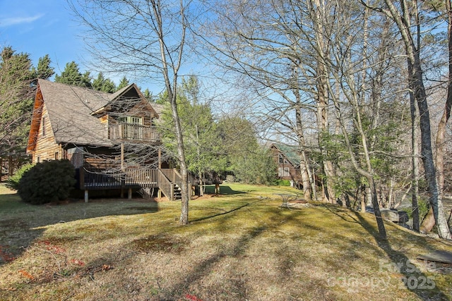 view of yard featuring a deck