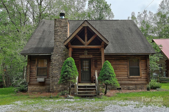49 Breezy Creek Ln, Maggie Valley, NC 28751 - log-style house featuring log exterior, roof with shingles, and a chimney
