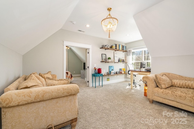 interior space featuring lofted ceiling, a chandelier, visible vents, baseboards, and carpet