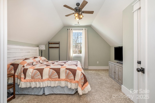 bedroom featuring lofted ceiling, light carpet, baseboards, and a ceiling fan