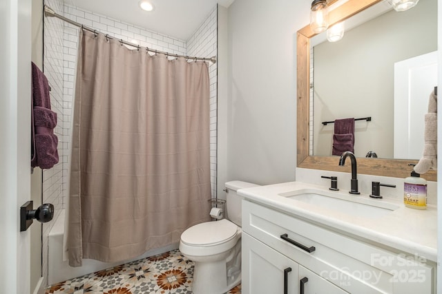 bathroom featuring recessed lighting, vanity, toilet, and shower / tub combo with curtain