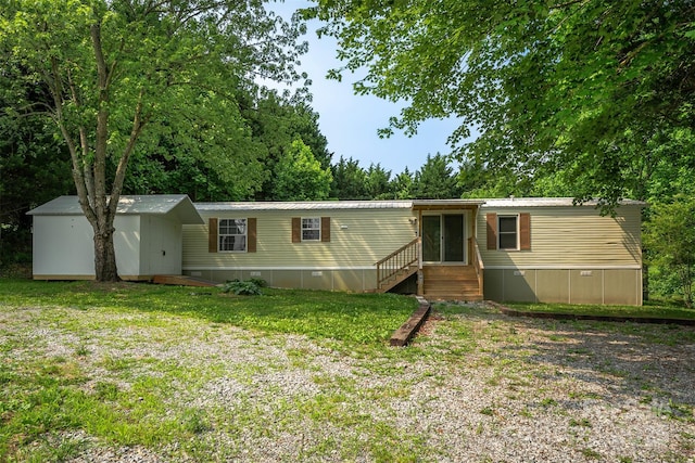 843 Deep Gap Loop Rd, Flat Rock, NC 28731 - manufactured / mobile home with entry steps and a front yard