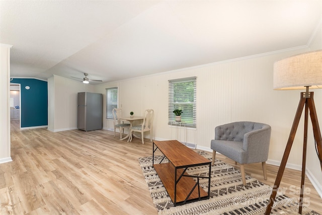 843 Deep Gap Loop Rd, Flat Rock, NC 28731 - living area featuring crown molding, light wood-style floors, ceiling fan, baseboards, and vaulted ceiling