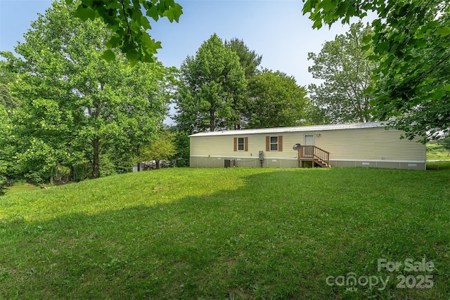 843 Deep Gap Loop Rd, Flat Rock, NC 28731 - back of property with a lawn