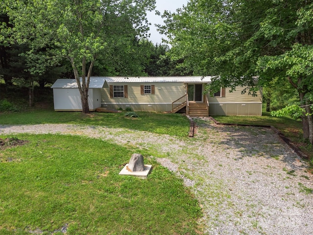 843 Deep Gap Loop Rd, Flat Rock, NC 28731 - manufactured / mobile home with a front lawn and metal roof