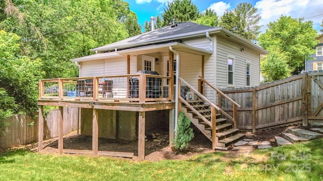 124 Dodge St, Asheville, NC 28803 - back of house with a fenced backyard, a deck, and stairs