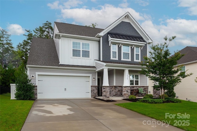 craftsman inspired home with covered porch, concrete driveway, board and batten siding, a standing seam roof, and a front lawn