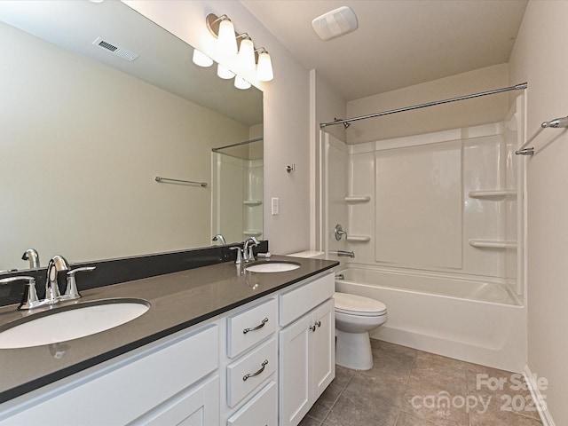 bathroom featuring visible vents, a sink, and toilet