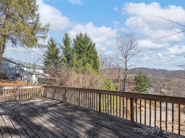 deck featuring a water view