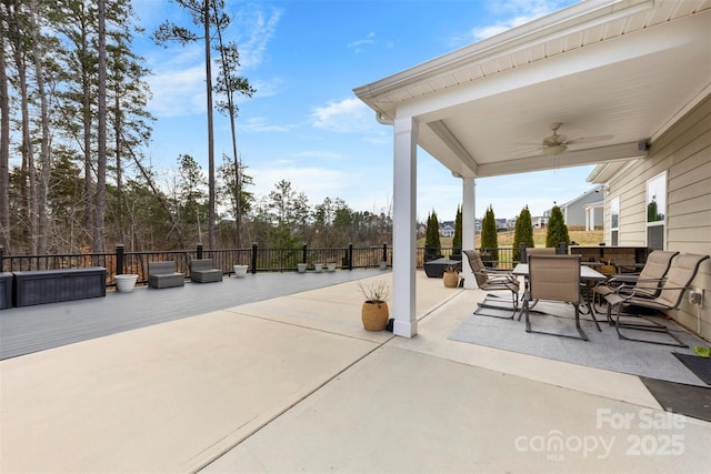 view of patio with ceiling fan and outdoor dining area