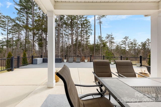 view of patio with outdoor dining area