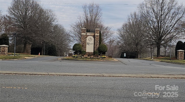 view of road featuring curbs and sidewalks