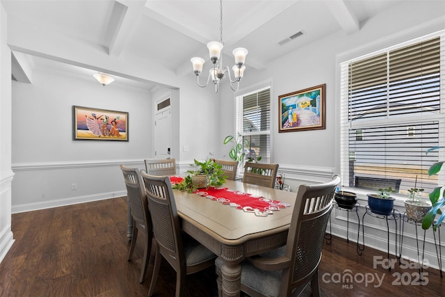 dining room featuring a chandelier, beamed ceiling, wood finished floors, and visible vents