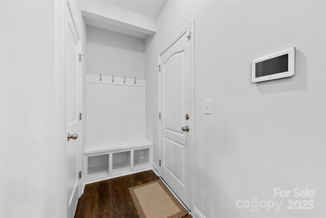 mudroom with dark wood-style floors