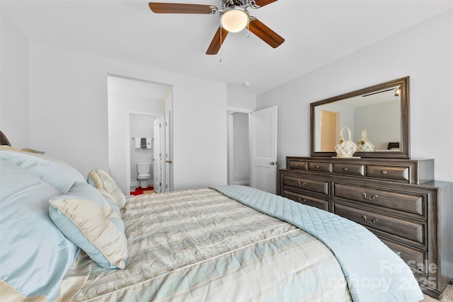 bedroom with ensuite bath and a ceiling fan